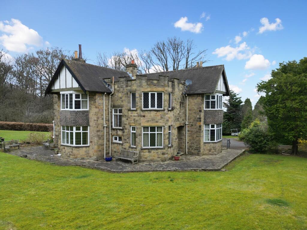 Main image of property: Large House & Outbuildings - Bramwood, 11 Creskeld Crescent, Bramhope, Leeds, LS16 9EH