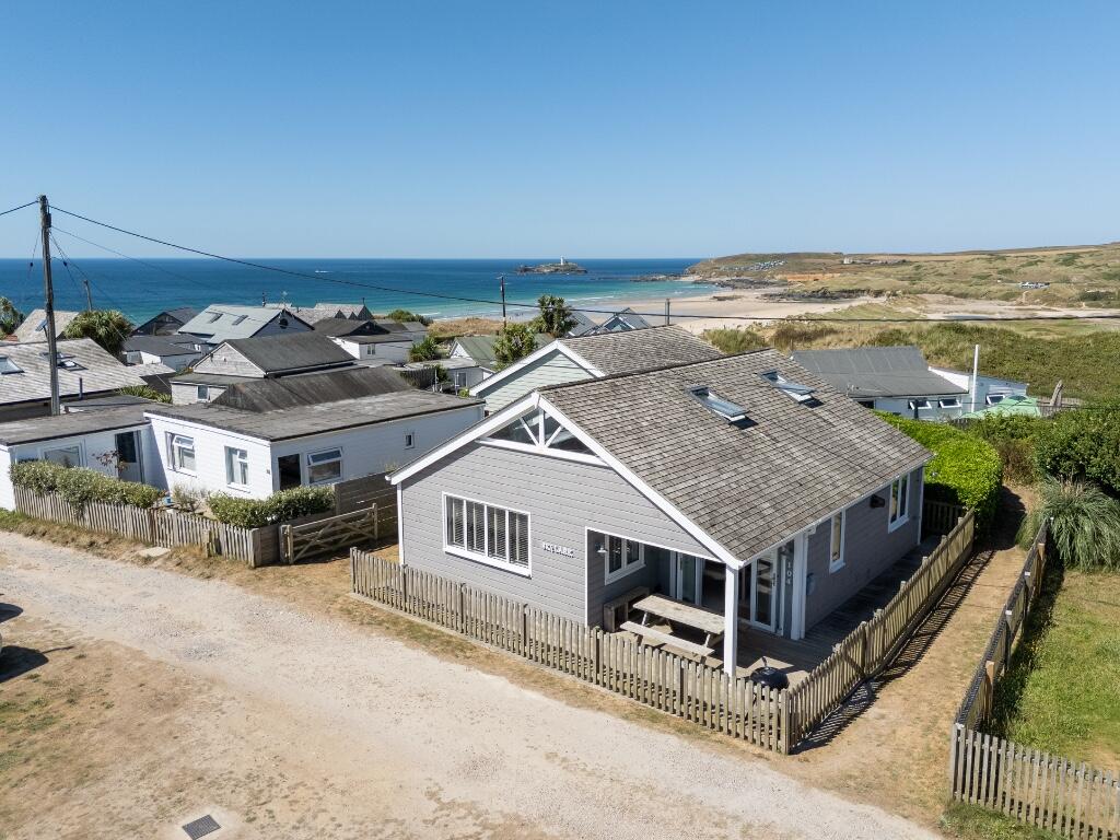 Main image of property: 104 Gwithian Towans - Gwithian - Stunning 3 bedroom beach house with 3 parking spaces.