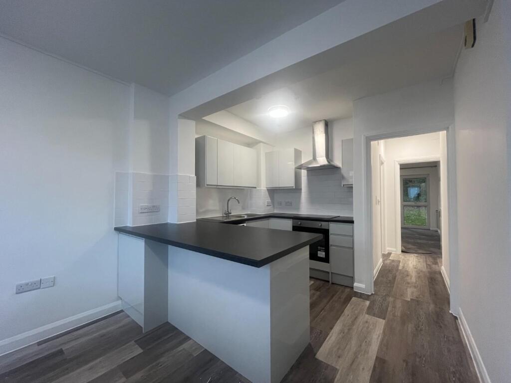 Main image of property: 8-10 Woodcote Side, Epsom