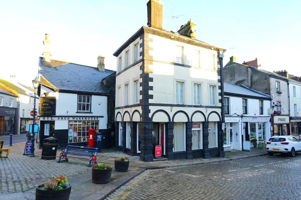 Main image of property: Shop & Flats, Market Place, Ulverston