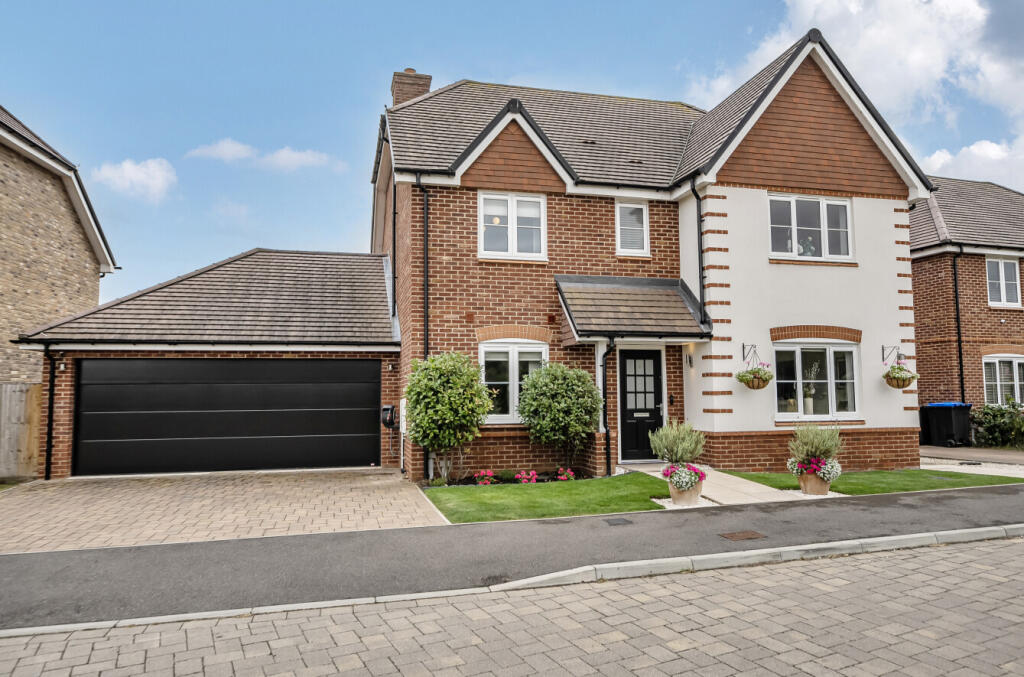 Main image of property: Dillmount Drive, Walton-on-Thames, Surrey, KT12