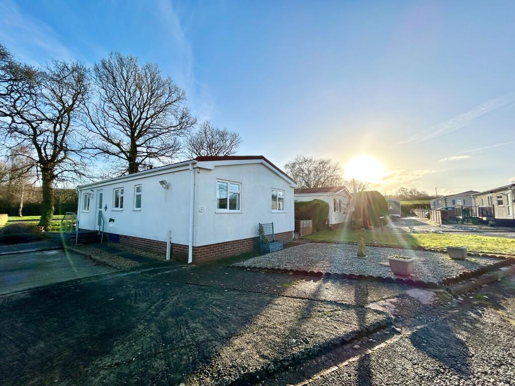 Main image of property: Woodlands Park, Tedburn St Mary, Exeter EX6 6AE