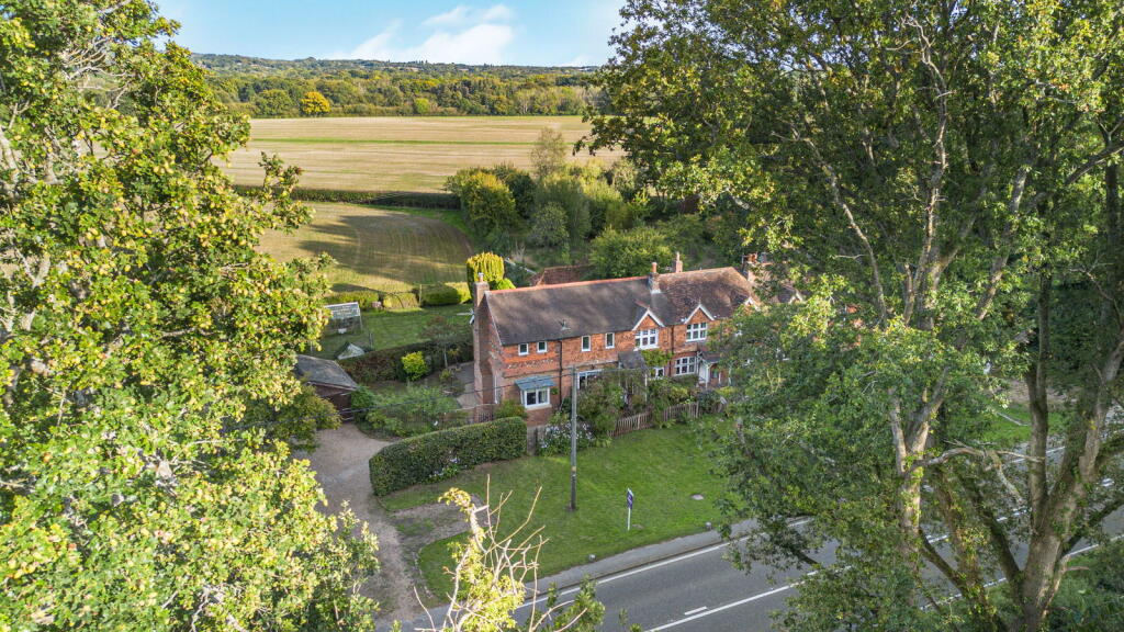 Main image of property: Robin How Cottage, Grafham, Bramley, Guildford, GU5 0LJ