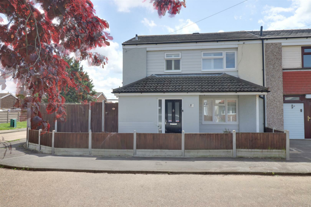 Main image of property: * DRIVEWAY AND GARAGE TO REAR * First Avenue, Canvey Island