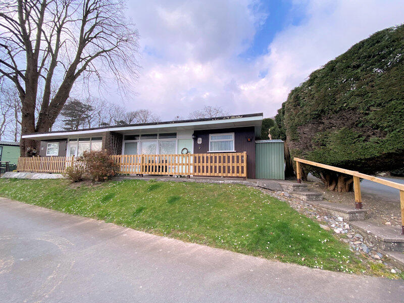 Main image of property: Chalet 45 Woodlands Holiday Park, Bryncrug, Gwynedd LL36 9UH