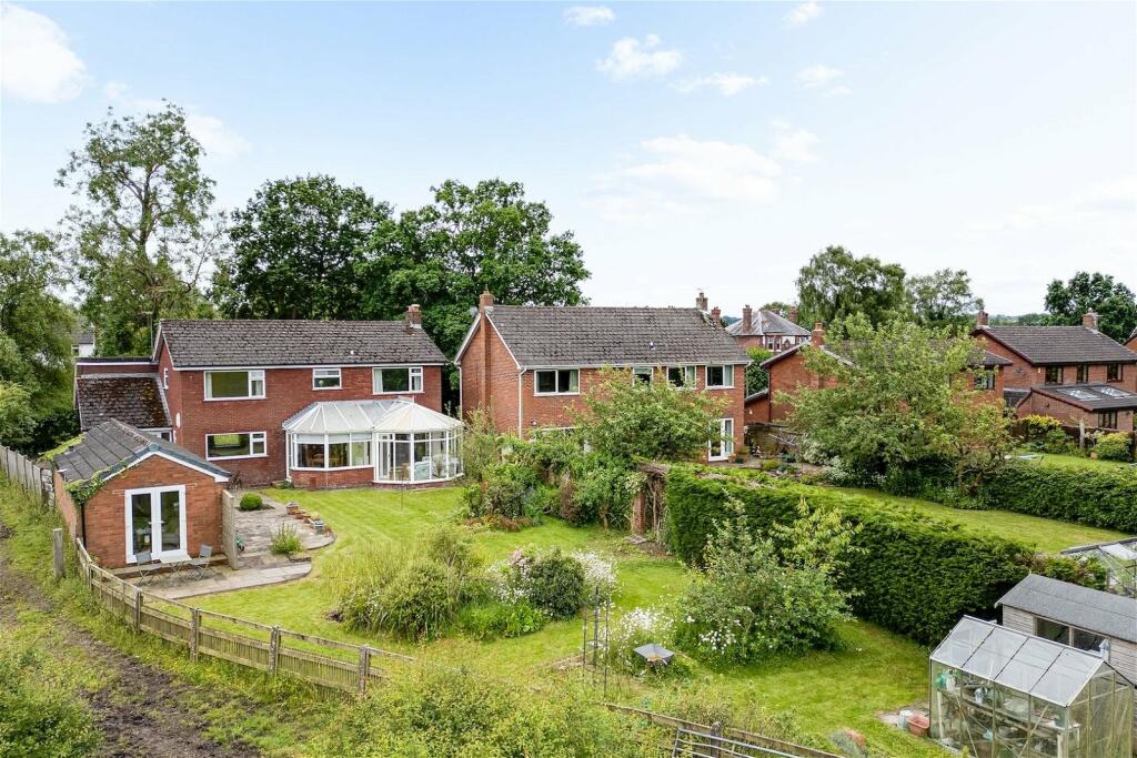 Main image of property: Detached house with a self contained annexe in nearly 1/3 acre plot