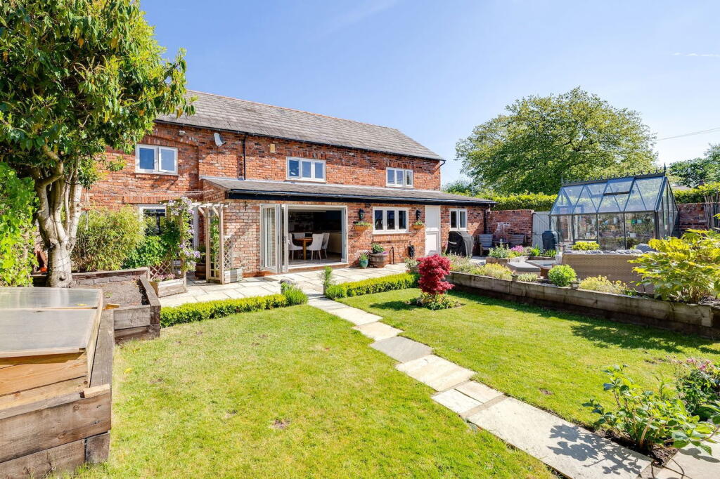 Main image of property: Stylish home with rural views located minutes from Stockton Heath