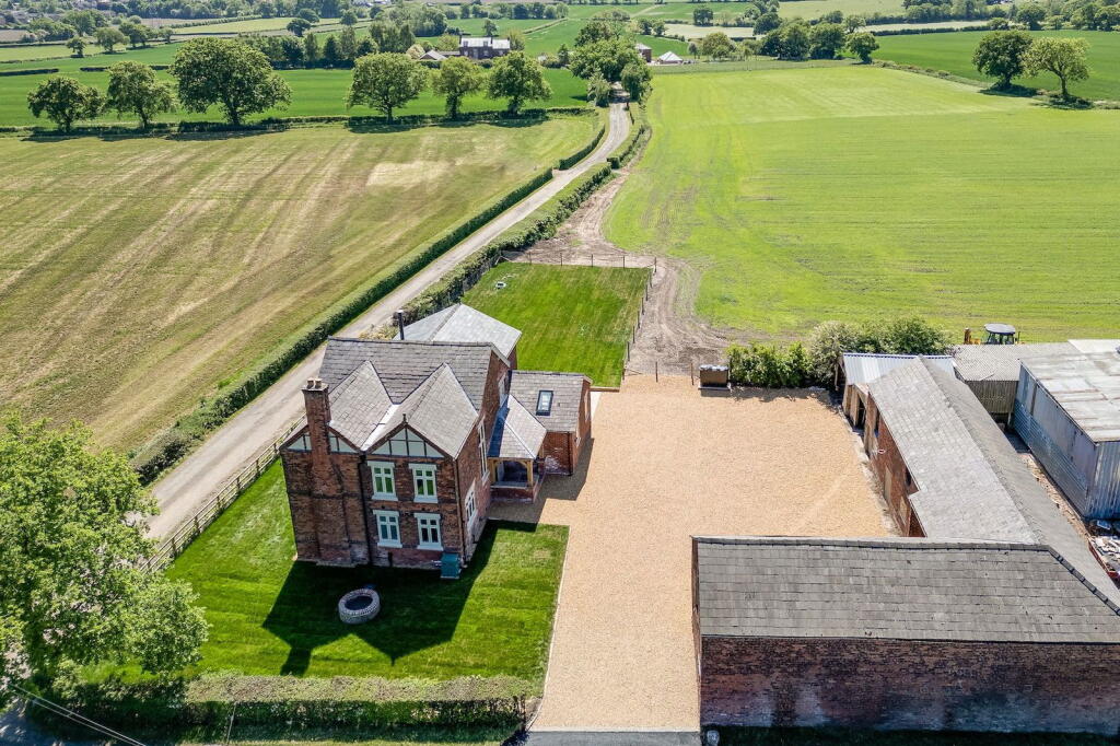 Main image of property: Magnificent re-developed farmhouse with extensive outbuildings