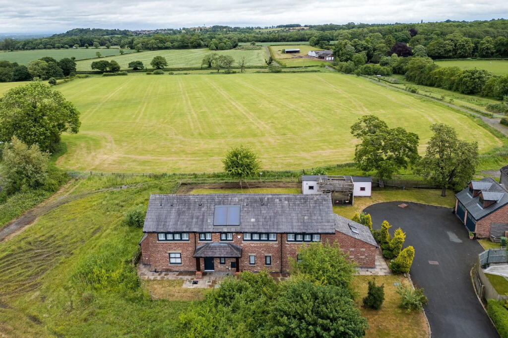 Main image of property: Stunning barn conversion in Daresbury with open views