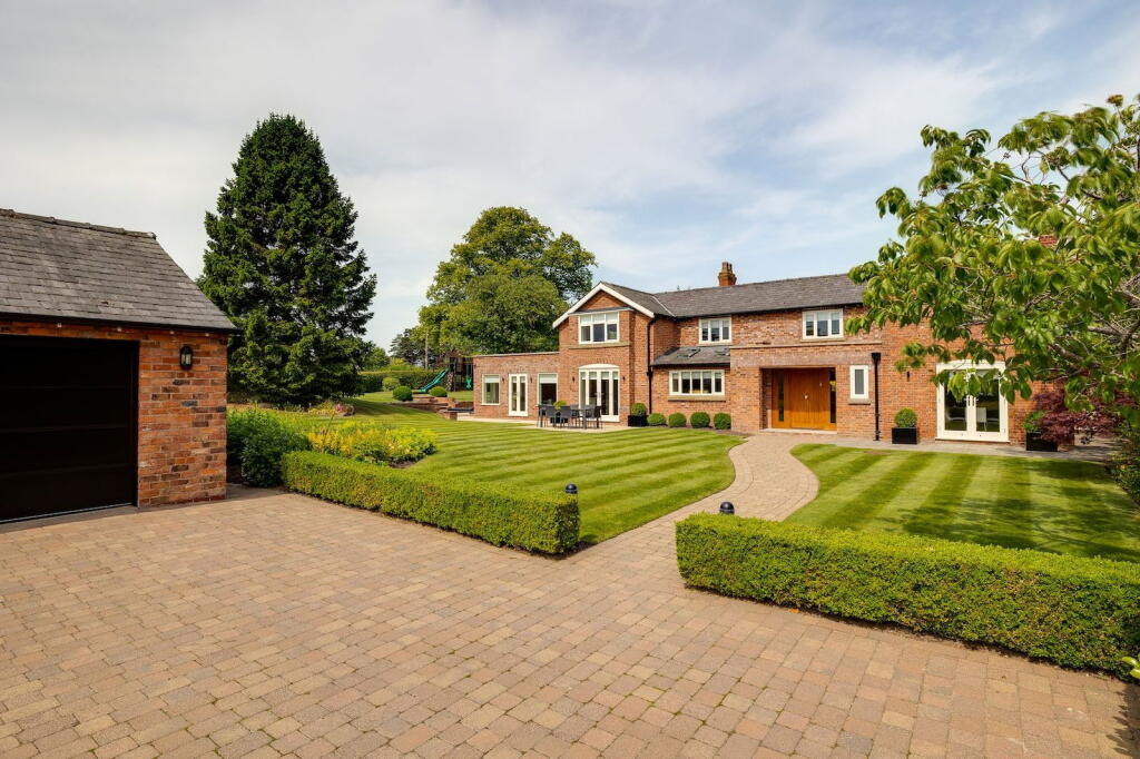 Main image of property: Country House in Mobberley with 1.5 acres