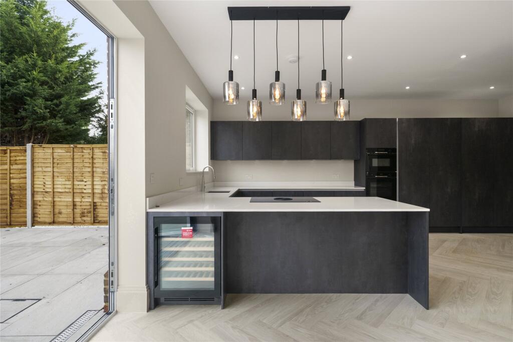 Main image of property: Queens Road, Hersham, Walton-on-Thames, Surrey, KT12