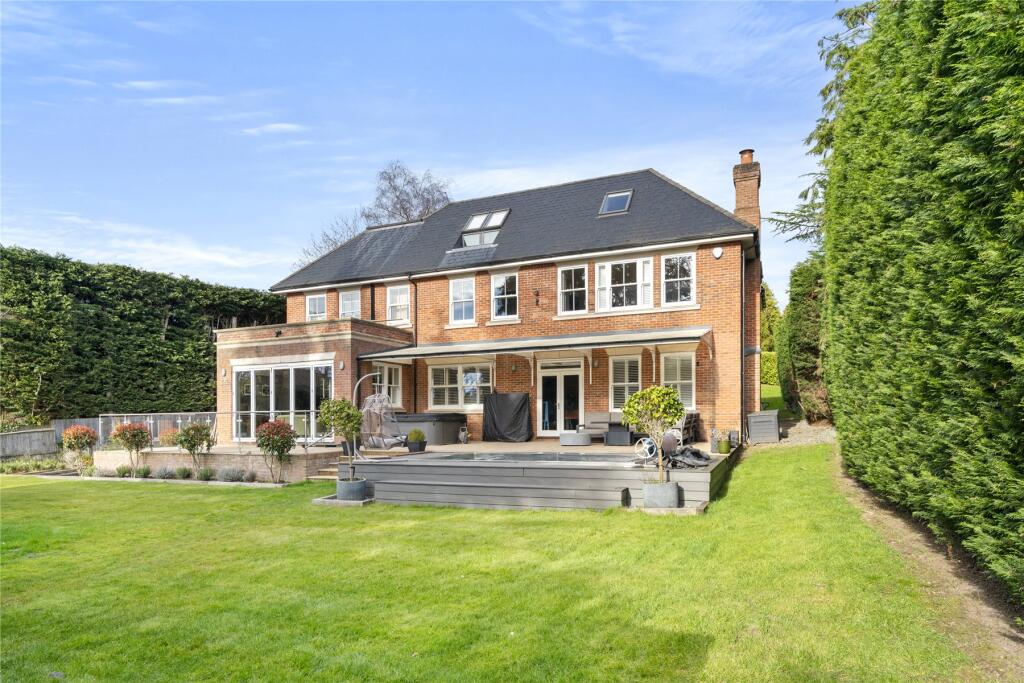 Main image of property: Woodpecker Close, Cobham, Surrey, KT11