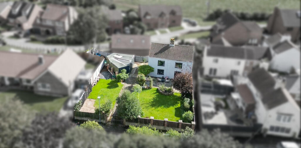 Main image of property: Pebbly Cottage, High Street, East Cowick, DN14