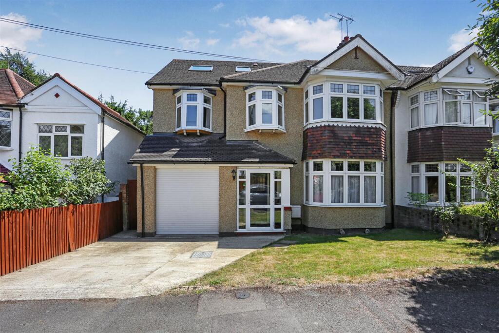 Main image of property: Pine Walk, Woodmansterne