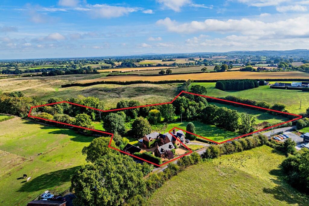 Main image of property: Smithy House, Checkley Lane, Bridgemere, Nantwich, Cheshire, CW5 7PX