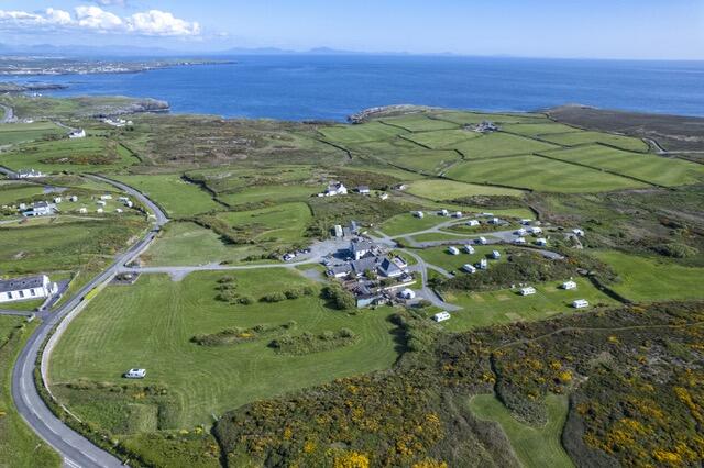 Main image of property: Premium touring caravan and park with far reaching sea views on the Isle of Anglesey. 