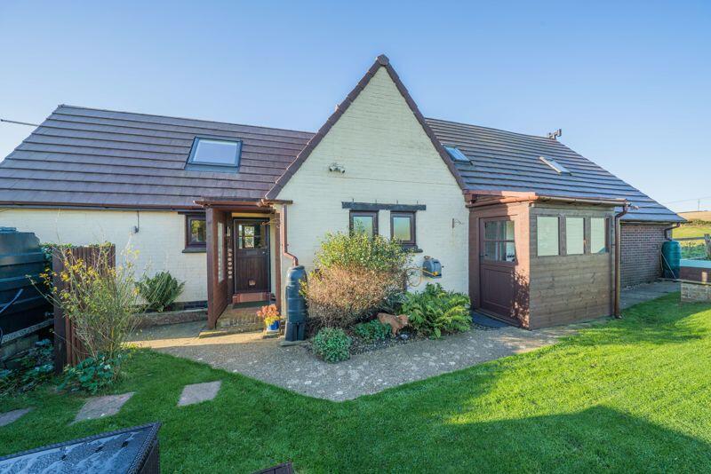 Main image of property: BURNGATE, LULWORTH - RURAL LOCATION WITH SEA & COUNTRYSIDE VIEWS