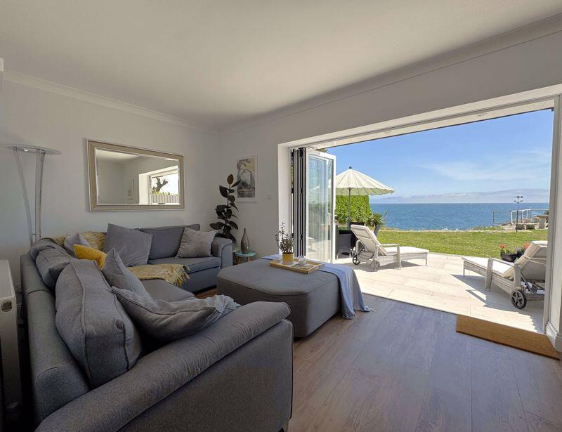 Main image of property: SUPERB NEWLY RENOVATED GROUND FLOOR GARDEN FLAT WITH DIRECT SEA VIEWS