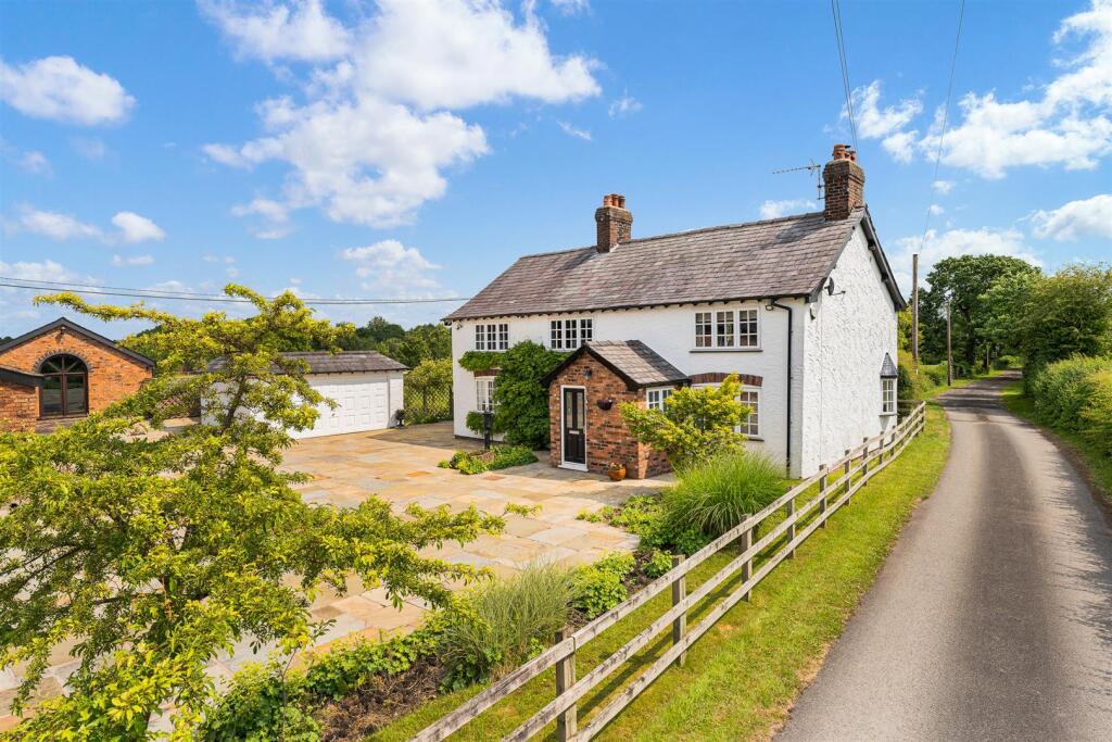 Main image of property: Detached farmhouse, 8 acres & extensive range of outbuildings