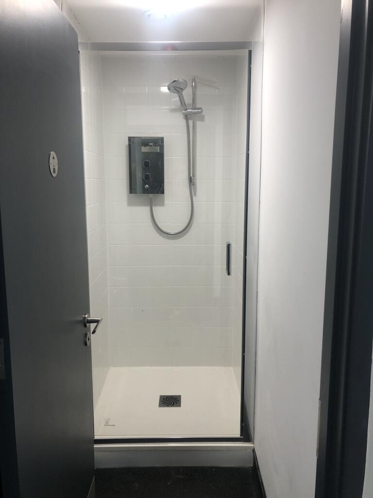 Communal shower in building