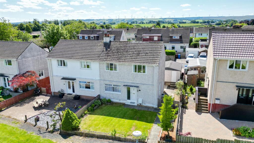Main image of property: Woodside Walk, Strathaven