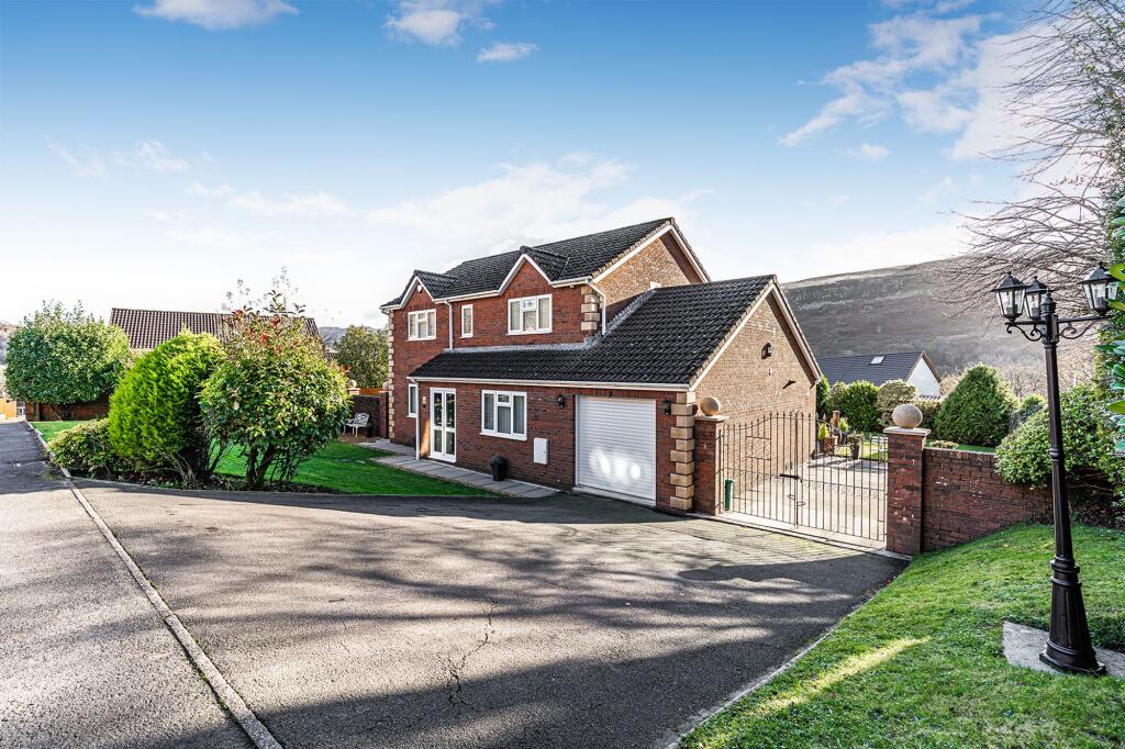 Main image of property: Bronheulwen, Porth, CF39