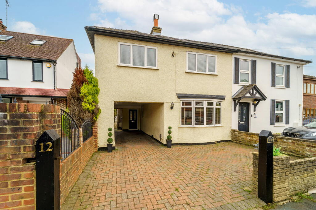 Main image of property: Common Lane, New Haw, KT15