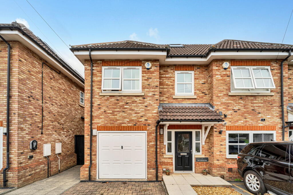 Main image of property: Grange Road, New Haw, KT15