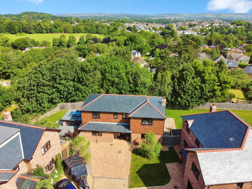 Main image of property: Woodlands, Luccombe.