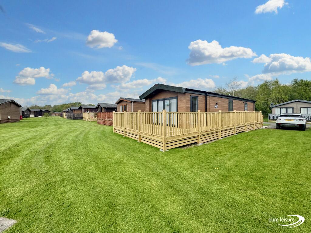 Main image of property: Atlas Jasmine Lodge South Lakeland Leisure Village, Carnforth LA6 1BH