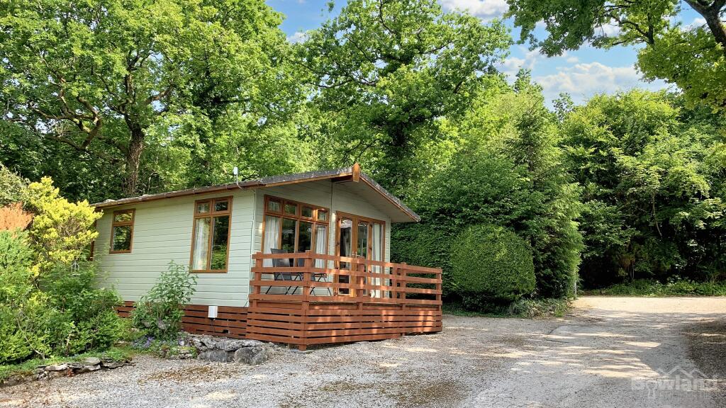 Main image of property: 6, Woodland Walk, Fell End Holiday Park, Milnthorpe, LA7 6BS