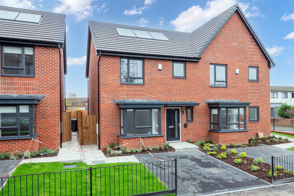 Main image of property: Black Brook Close, Ardwick, M12