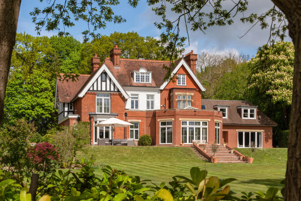 Main image of property: Woodlands Lane, Cobham, KT11