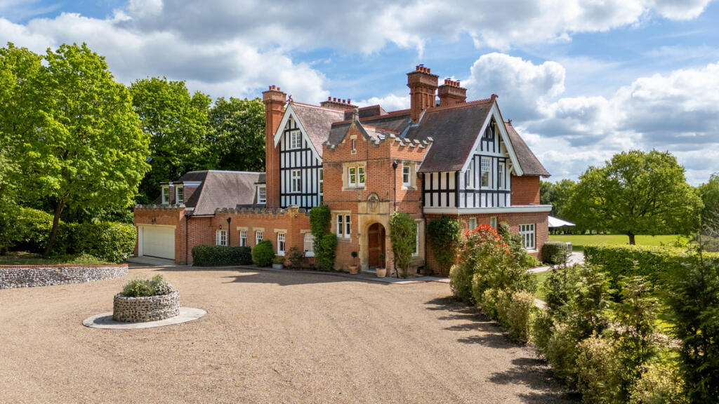 Main image of property: Woodlands Lane, Cobham, KT11