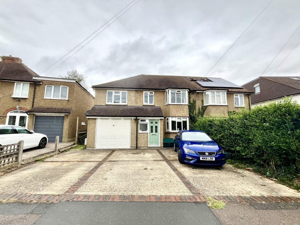 Main image of property: Devon Way, Chessington, Surrey. KT9 2RJ