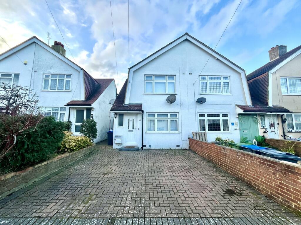 Main image of property: Roebuck Road, Chessington, Surrey. KT9 1JY