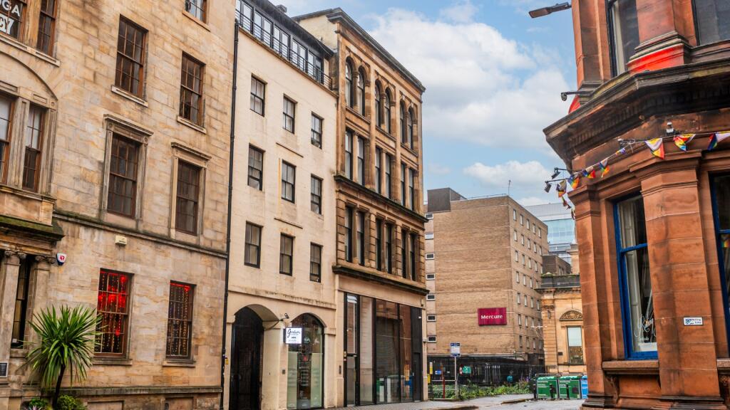 Main image of property: Virginia Street Flat 2/1, Merchant City, Glasgow , G1 1TS