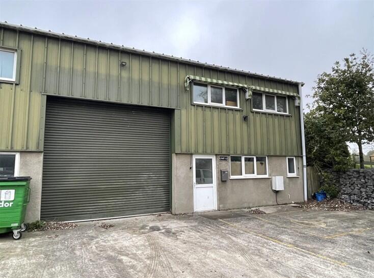 Main image of property: Unit 12, Lapthorne Industrial Estate, Totnes Road, Ipplepen, Newton Abbot, Devon, TQ12 5TN