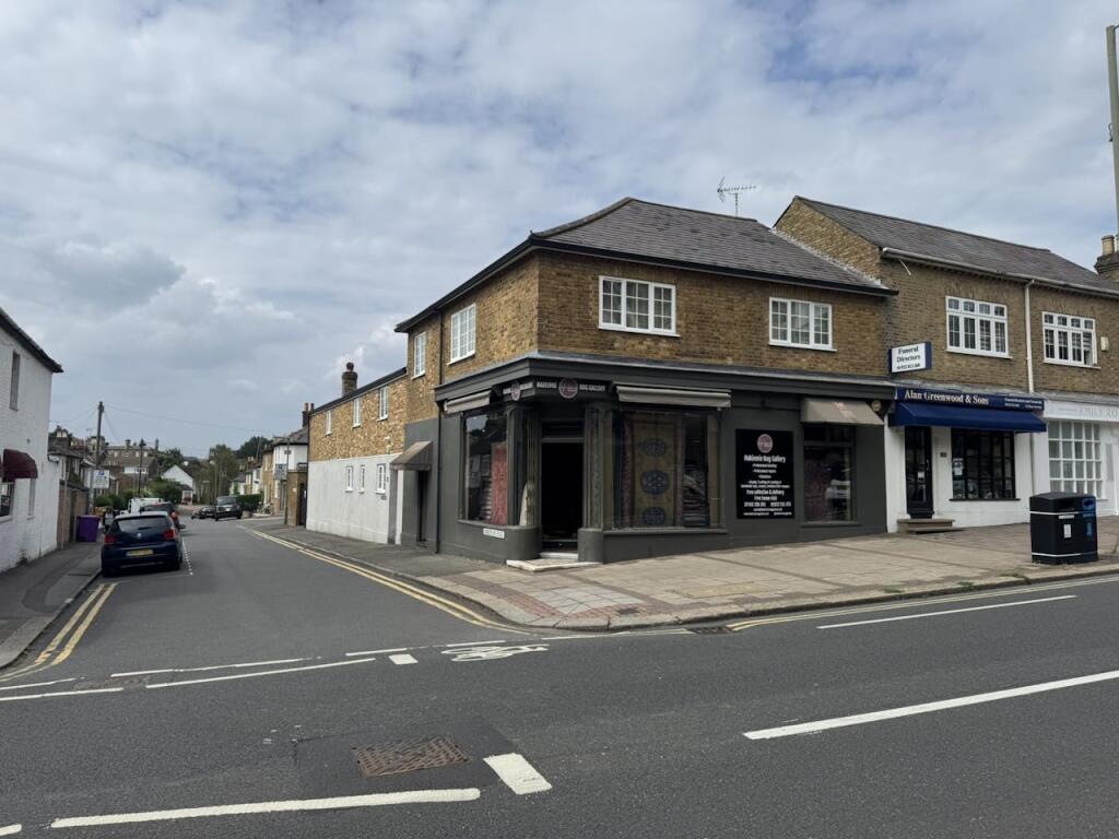 Main image of property: 130 Oatlands Drive, Weybridge, KT13 9HL