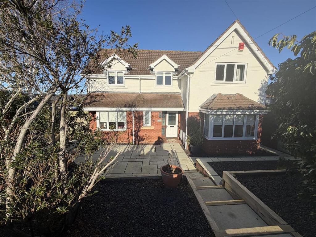 Main image of property: An executive detached family home set in a prime corner plot in Nailsea