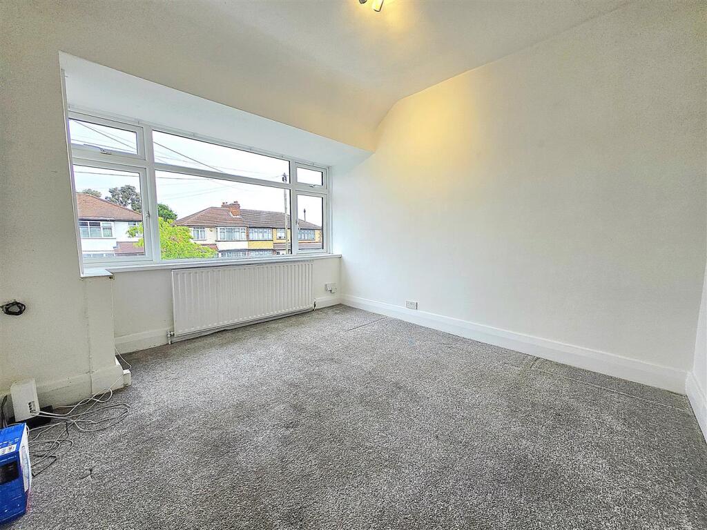 Main image of property: Wood End Gardens, Northolt