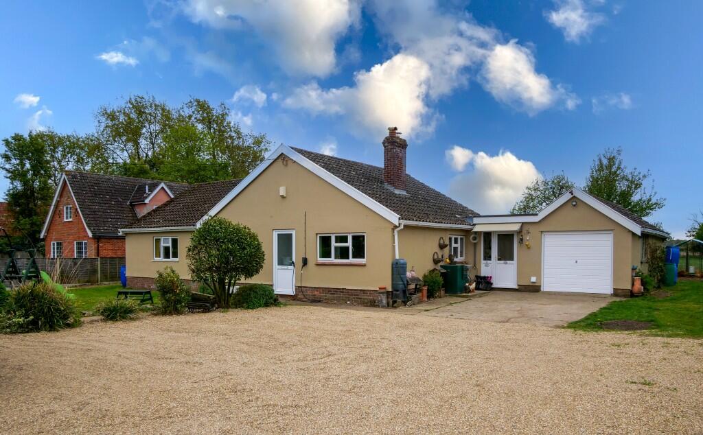 Main image of property: A SPACIOUS FOUR BEDROOM DETACHED BUNGALOW in the village of Bedfield set in a good sized plot with wrap around garden 