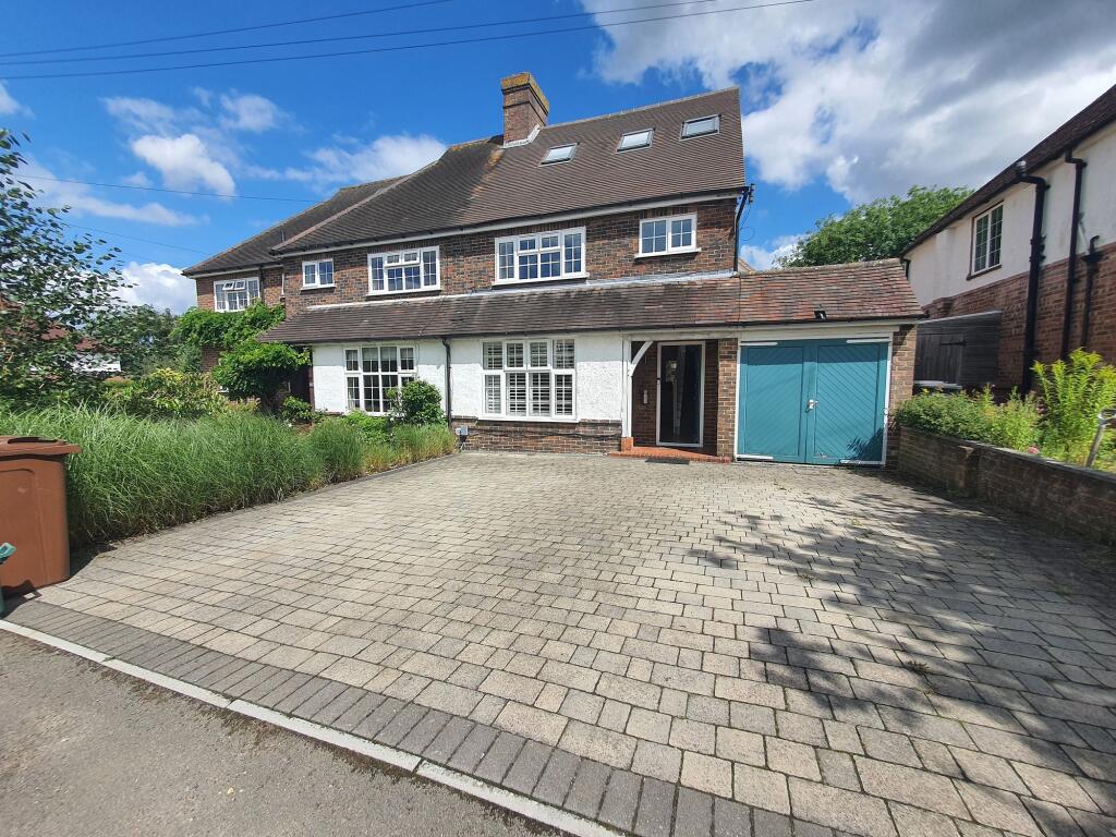 Main image of property: Daryngton Drive, Guildford, GU1