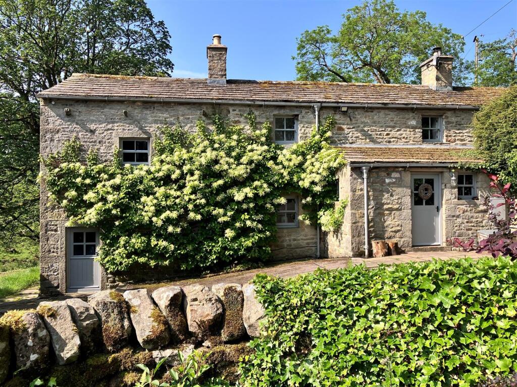 Main image of property: Dibbles Bridge Cottage and Annexe, Hartlington, Skipton