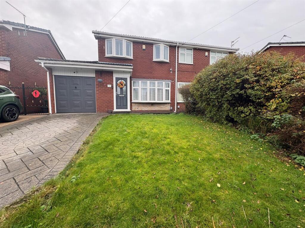 Main image of property: Bronville Close, Chadderton, Oldham