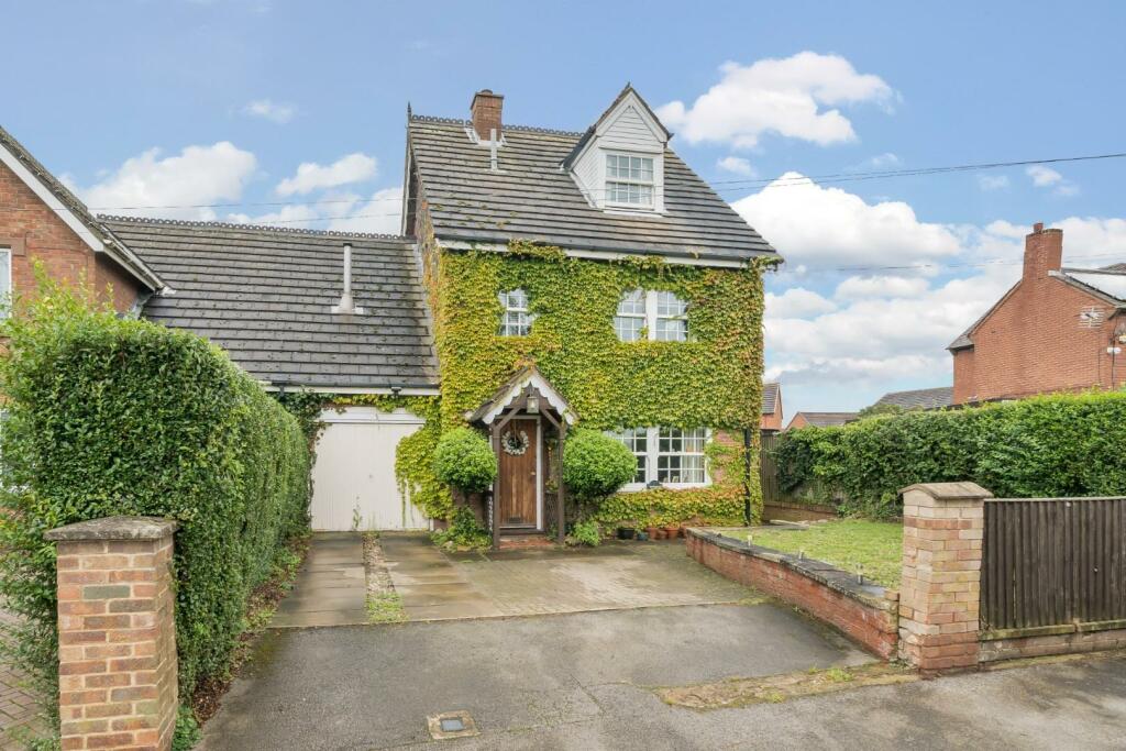 Someone seems to have gone out of their way to grow ivy over this new