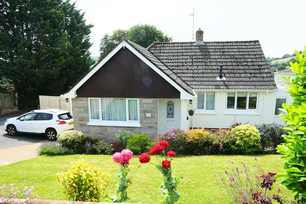 Main image of property: Churchill Road, stunning bungalow with views