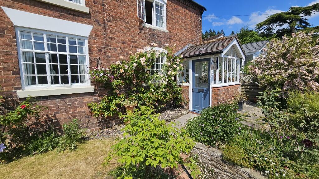 Main image of property: Vine Cottage, 81 Shrewsbury Road, Church Stretton, Shropshire, SY6 6EY