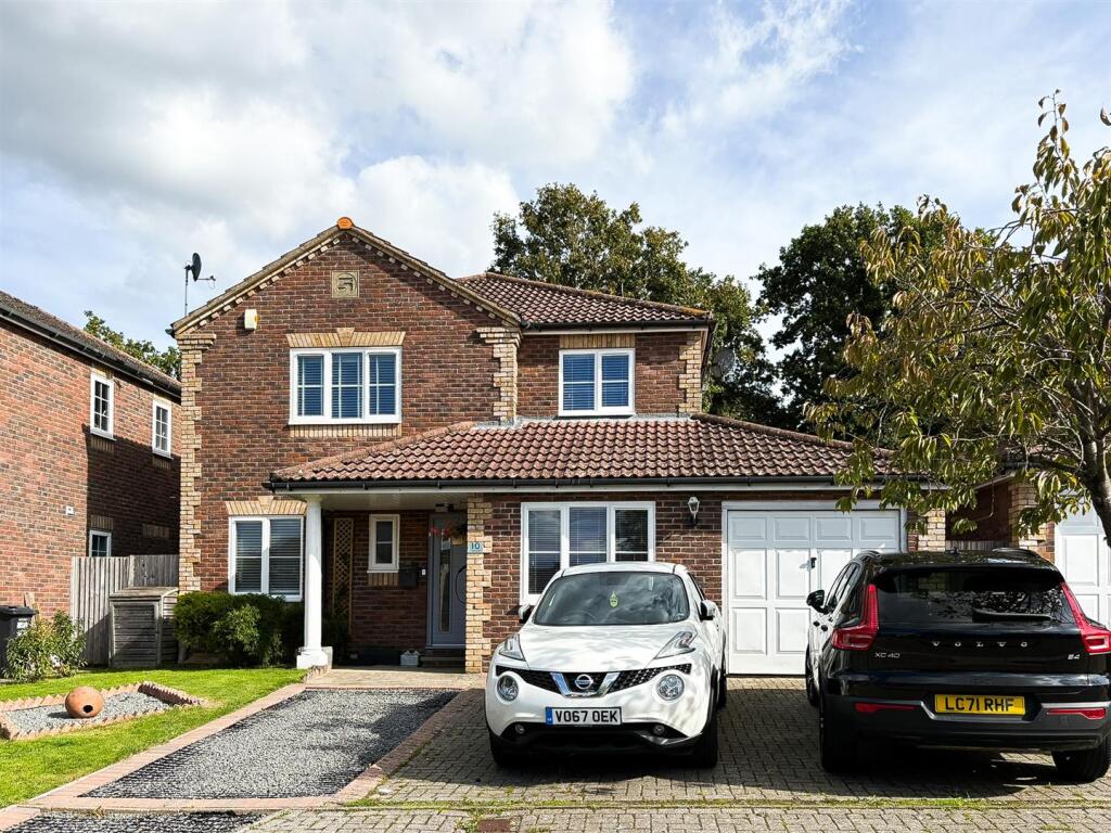 Main image of property: Woodpecker Crescent, Burgess Hill