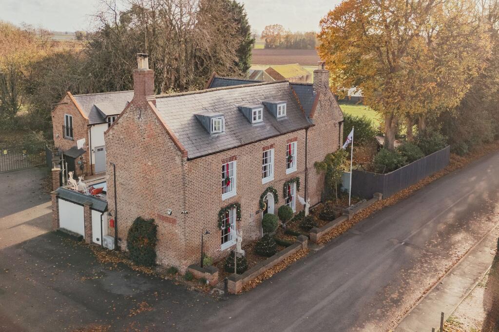 Main image of property: Stunning Long Sutton Home with Indoor Pool, Gym, Games Room, Annexe, and Landscaped Gardens